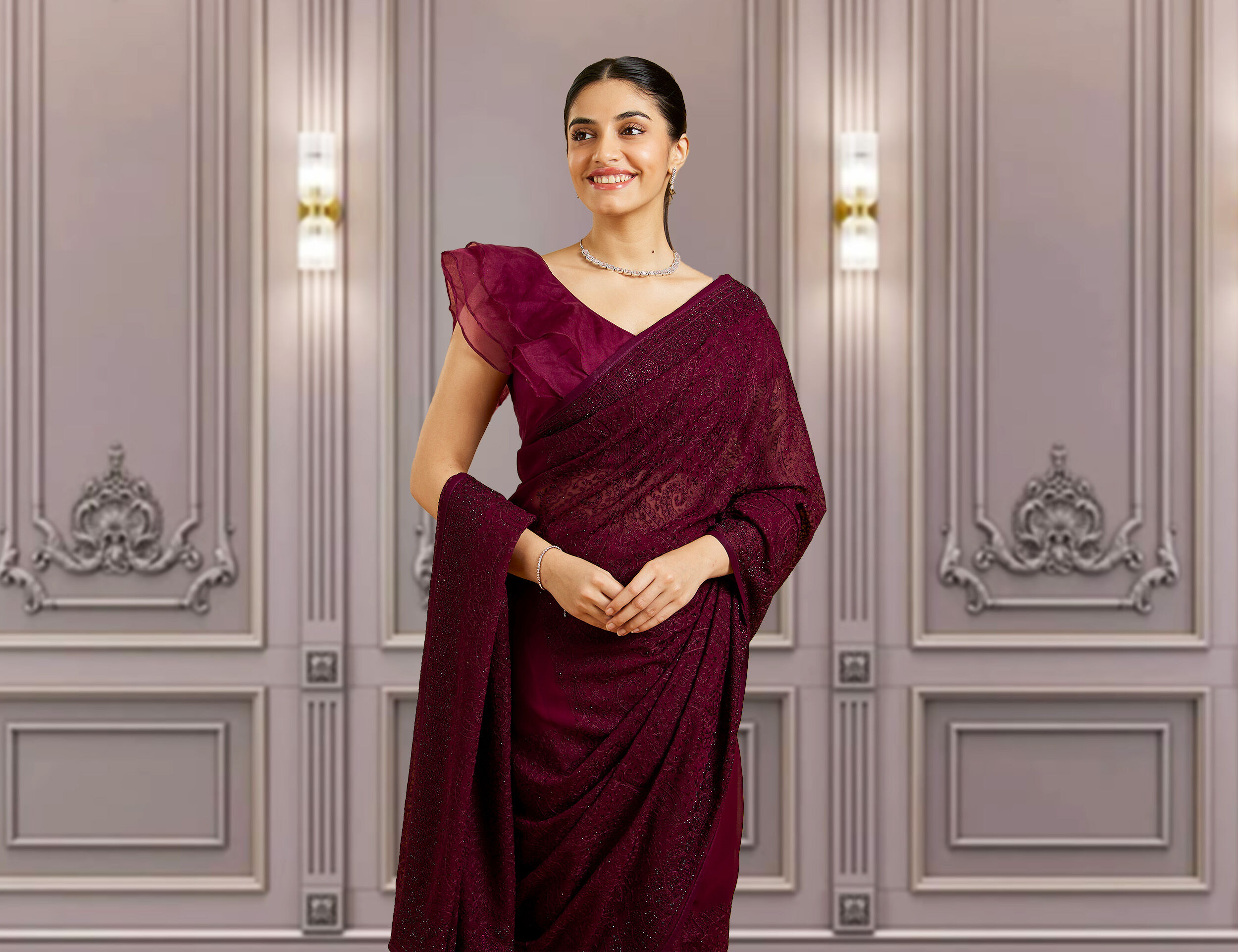 A women in beautifull brown saree for wedding attendance